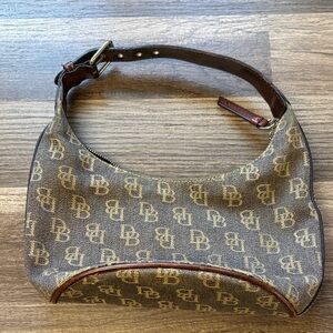 vintage Dooney & Bourke brown DB signature canvas hobo bag with leather trim.
